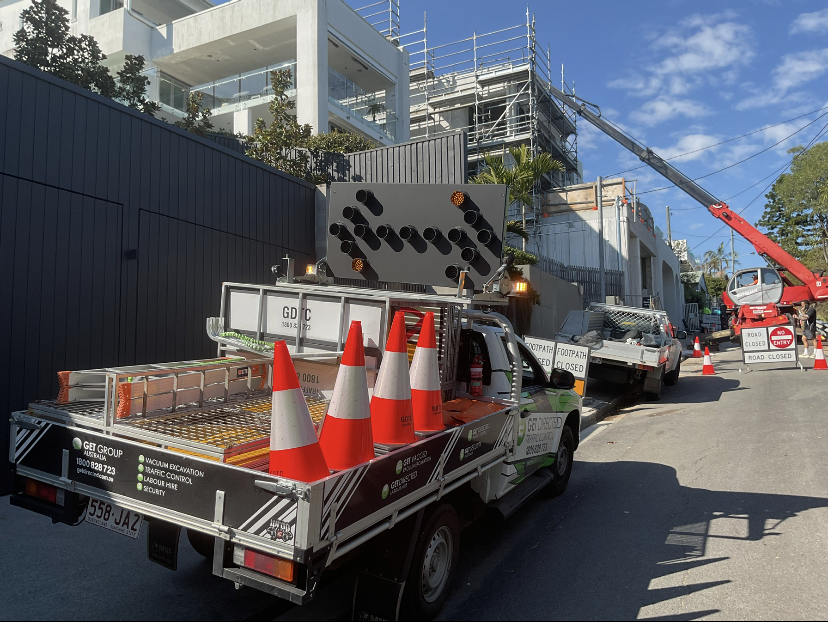 Get Directed traffic control vehicle and safety equipment at a construction worksite
