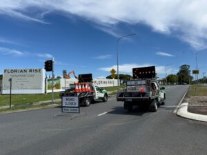 Gold Coast road closure — Get Directed traffic control utes positioned with arrow boards.