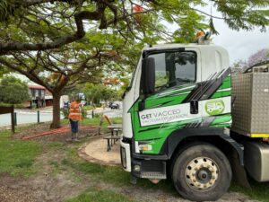 Non-destructive digging Brisbane — Get Vacc’ed operator using vacuum wand near tree roots and conduits.