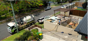 Get Vacced vac truck completing excavation work on a residential construction site