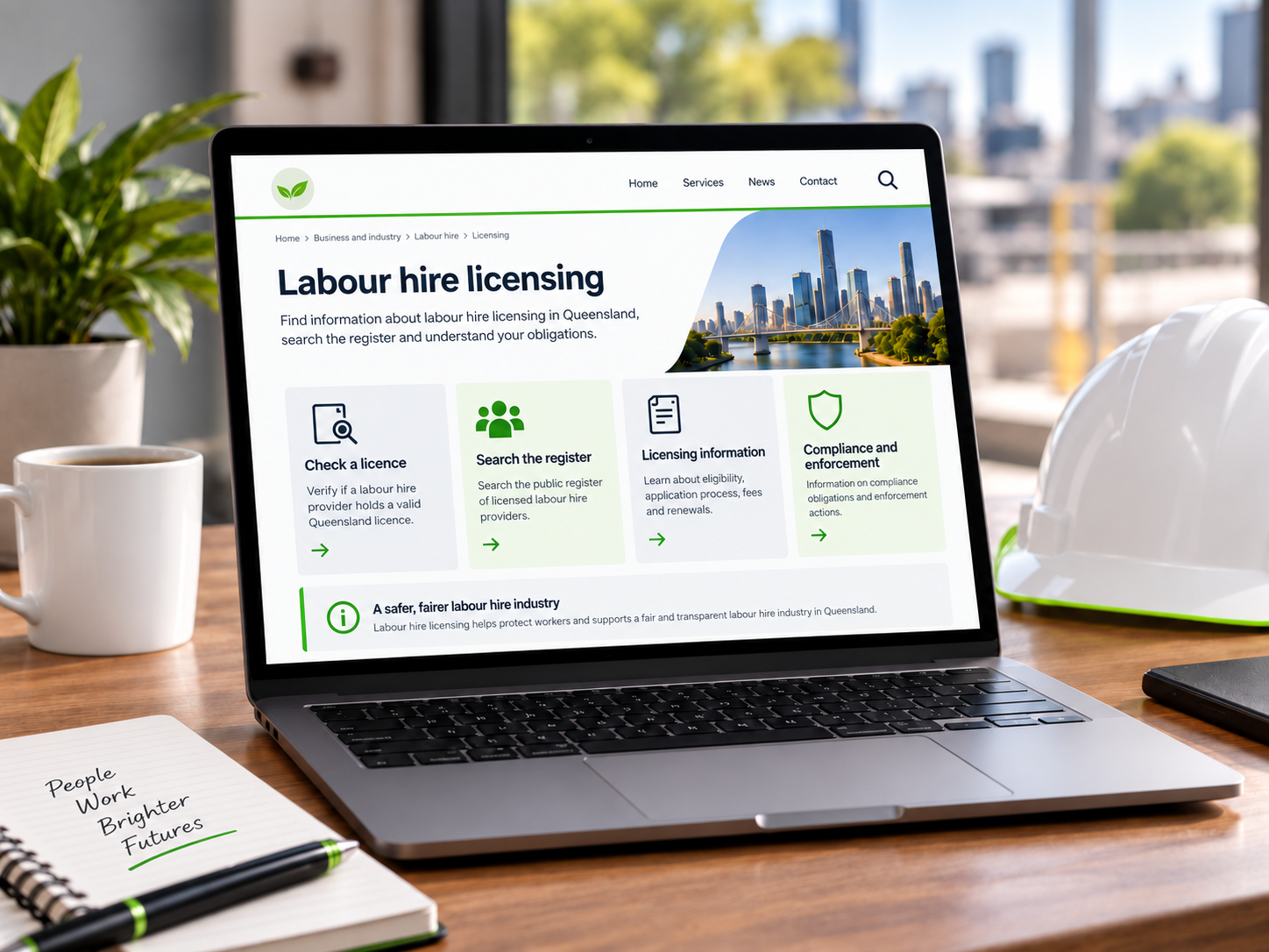 Queensland labour hire licensing information displayed on a laptop beside Get Group Australia safety gear